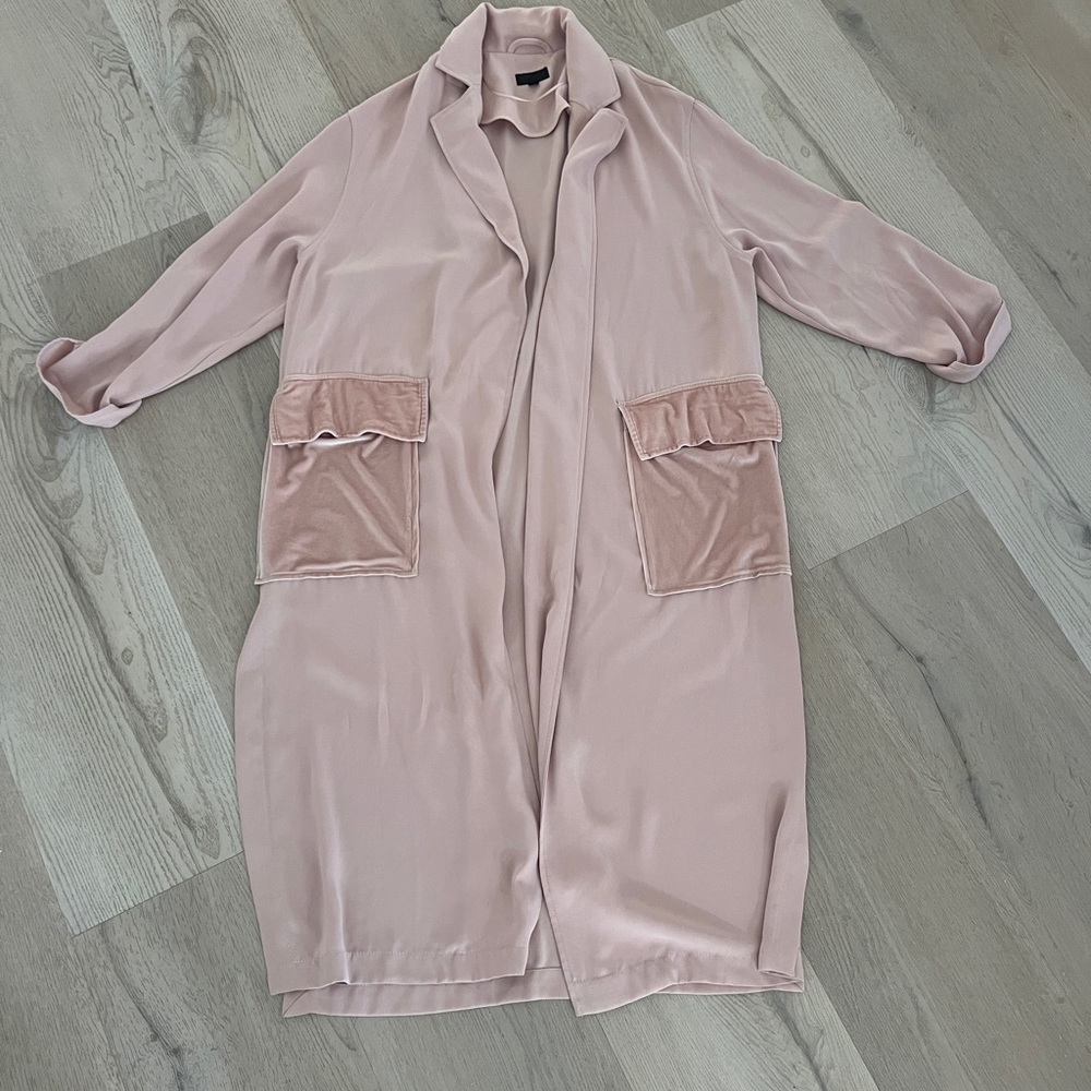 Trench coat/jacket. Condition like new. Beautiful color with velours pockets.